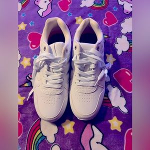 Women’s Levis White Sneakers.